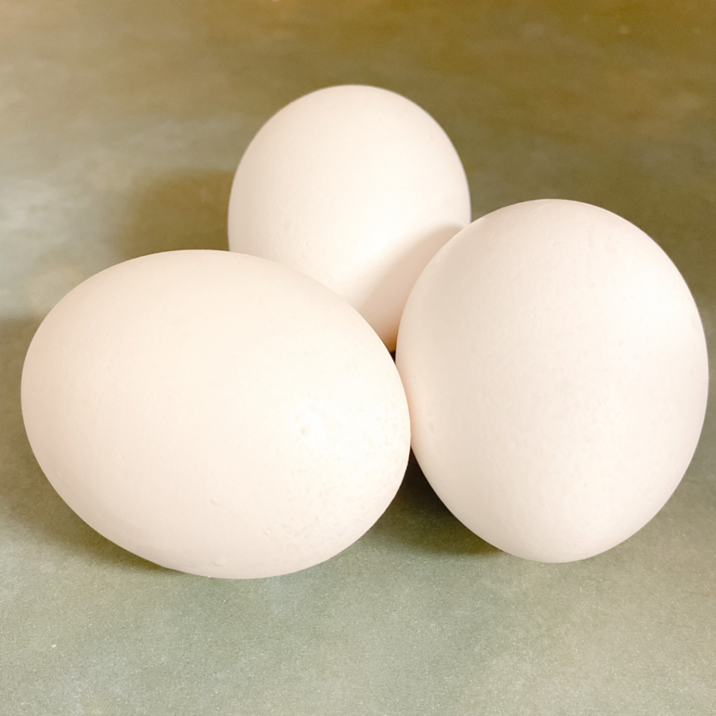 Three white eggs.